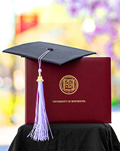 UMN diploma with a graduation cap