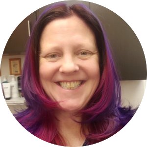 Jessica Miller - long purple and pink hair, smiling big